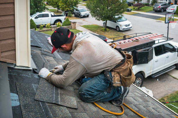 Professional Roof Replacement technician working in Mc Alisterville, PA